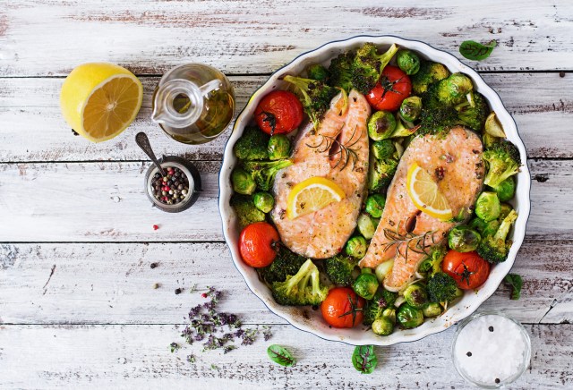 Baked salmon steak with vegetables. 